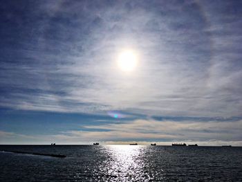 Scenic view of sea against sky at sunset