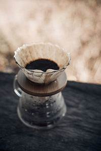 Close-up of coffee cup on table