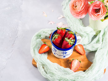 High angle view of various fruits in bowl on table