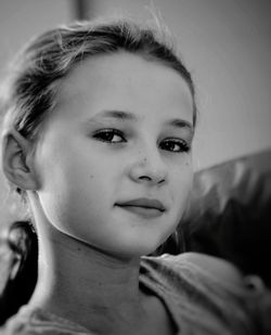 Close-up portrait of girl at home