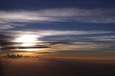 Scenic view of dramatic sky during sunset