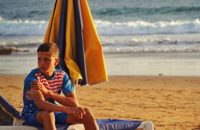 Man sitting on beach