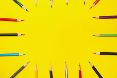 High angle view of colored pencils on table