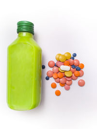 Close-up of multi colored candies in container