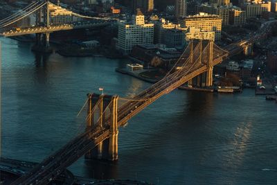 High angle view of bridges over east river at sunset