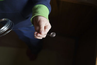 Cropped hand of person washing hands