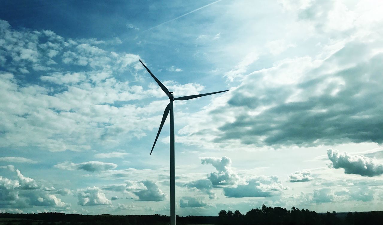 LOW ANGLE VIEW OF WIND TURBINES AGAINST SKY