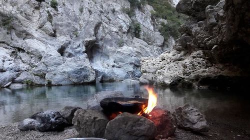 Scenic view of rock formation in water