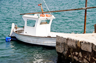 High angle view of boat sailing in sea