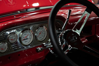 Close-up of vintage car dash board and steering wheel