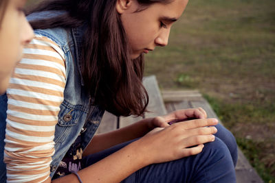 Young woman using mobile phone