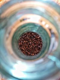 High angle view of coffee beans in glass