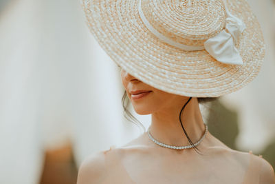 Portrait of woman wearing hat