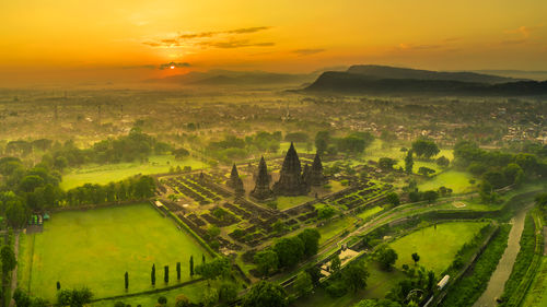 Scenic view of landscape against sky during sunset