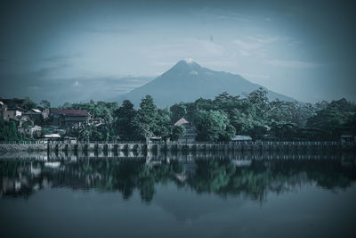 Scenic view of lake by trees against sky in tambak boyo yogyakarta indonesia