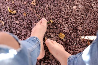 Low section of people with hands