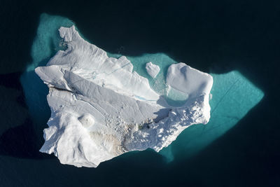 High angle view of iceberg on sea
