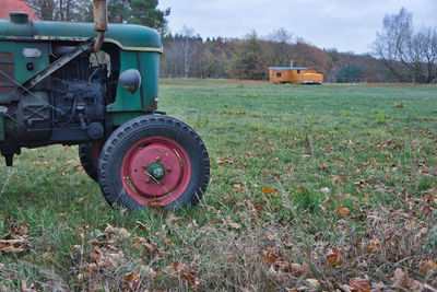 Old tractor on field