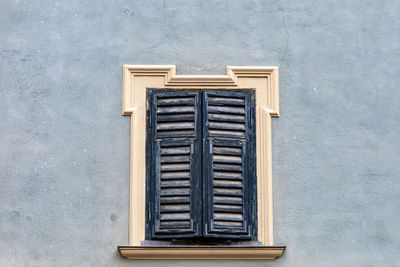 Close-up of closed window of building