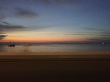 Scenic view of sea at sunset