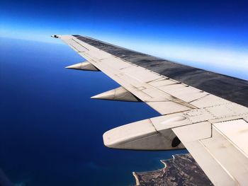 Cropped image of airplane wing