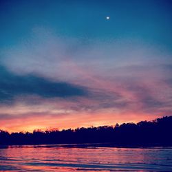 Scenic view of sea during sunset