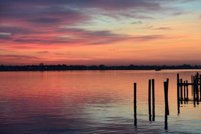 Scenic view of lake at sunset