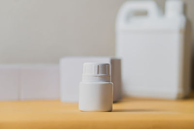 Close-up of beauty products on table