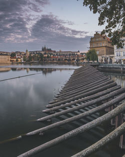 Sunrise view of charles bridge and prague castle over river vltava.