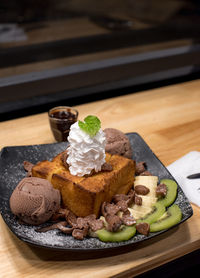 Close-up of food served on table