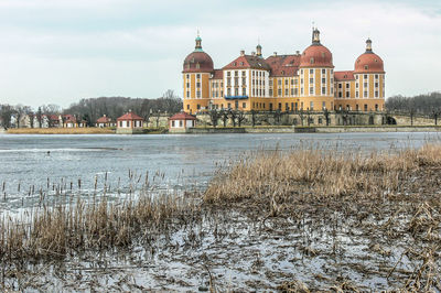 View of river in city during winter