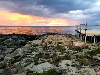 Scenic view of sea against sky during sunset