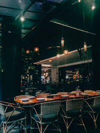 High angle view of illuminated restaurant table at night