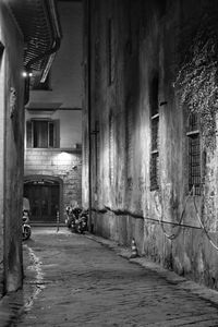 Man in illuminated building