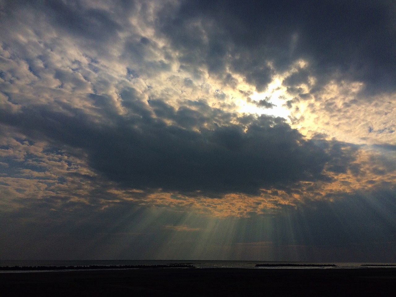 sky, cloud - sky, scenics, beauty in nature, tranquil scene, tranquility, cloudy, sunset, nature, sea, cloud, idyllic, cloudscape, weather, horizon over water, silhouette, dramatic sky, overcast, outdoors, no people