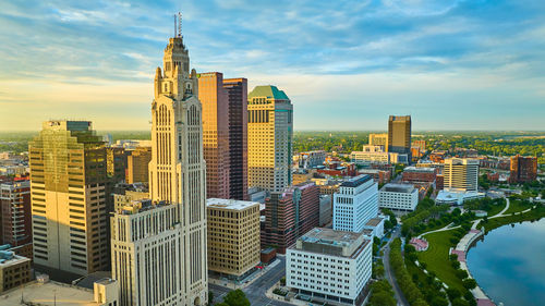 Buildings in city against sky