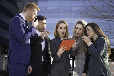 Business colleagues discussing in office