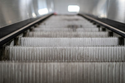 Low angle view of empty escalator