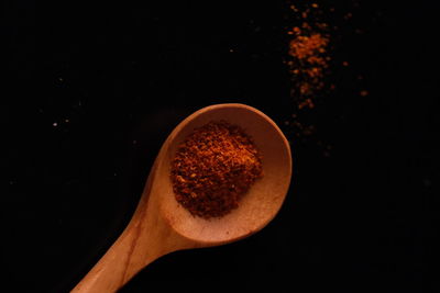 Close-up of bread against black background