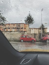 View of city seen through car window