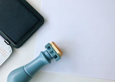 High angle view of mobile phone on table