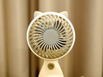 Close-up of electric lamp at home