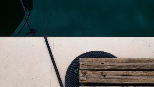 High angle view of swimming pool by wall