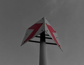 Low angle view of red pole against clear sky