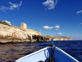 Scenic view of sea against blue sky