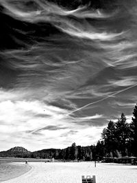 Scenic view of mountains against cloudy sky