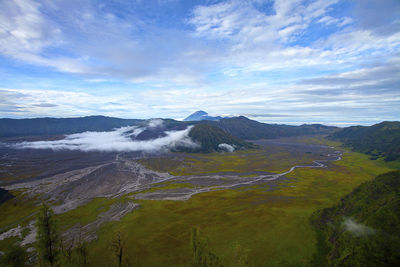 Scenic view of landscape against sky at mount bromo