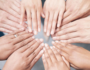 Cropped hands of woman massaging customer