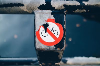 Warning sign on railing