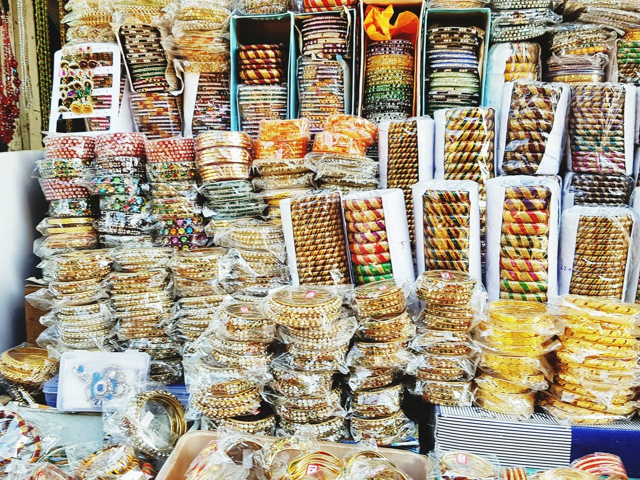 abundance, for sale, large group of objects, retail, market, variation, animal themes, market stall, indoors, arrangement, high angle view, choice, day, sale, collection, store, food and drink, no people